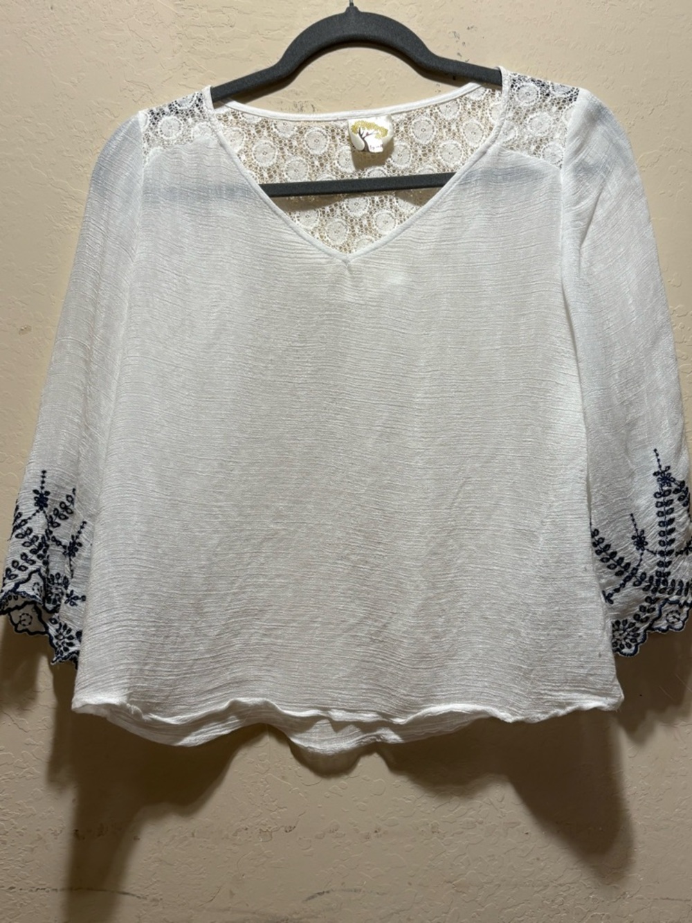 Lace-Back White Women's V-Neck Top with Navy Embroidery
